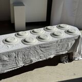 Set of 9 vintage turquoise deep plates with gold trim and pink flowers.