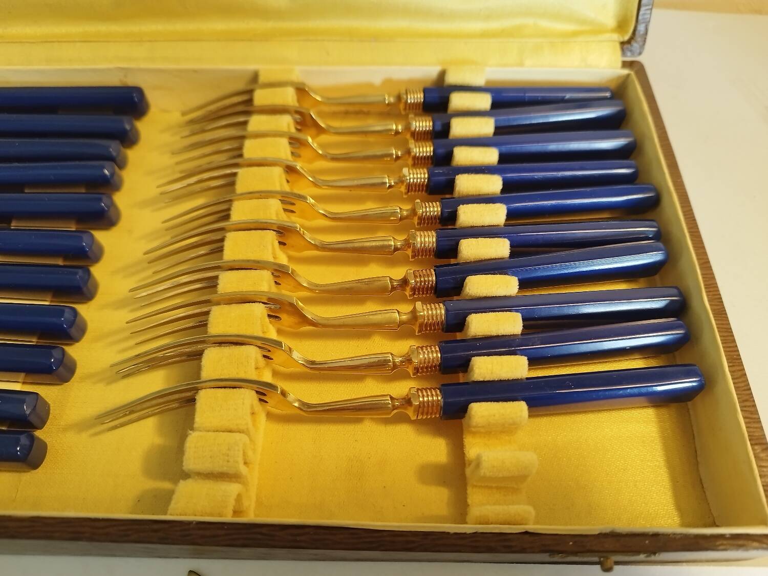Antique cake service in metal and blue bakelite