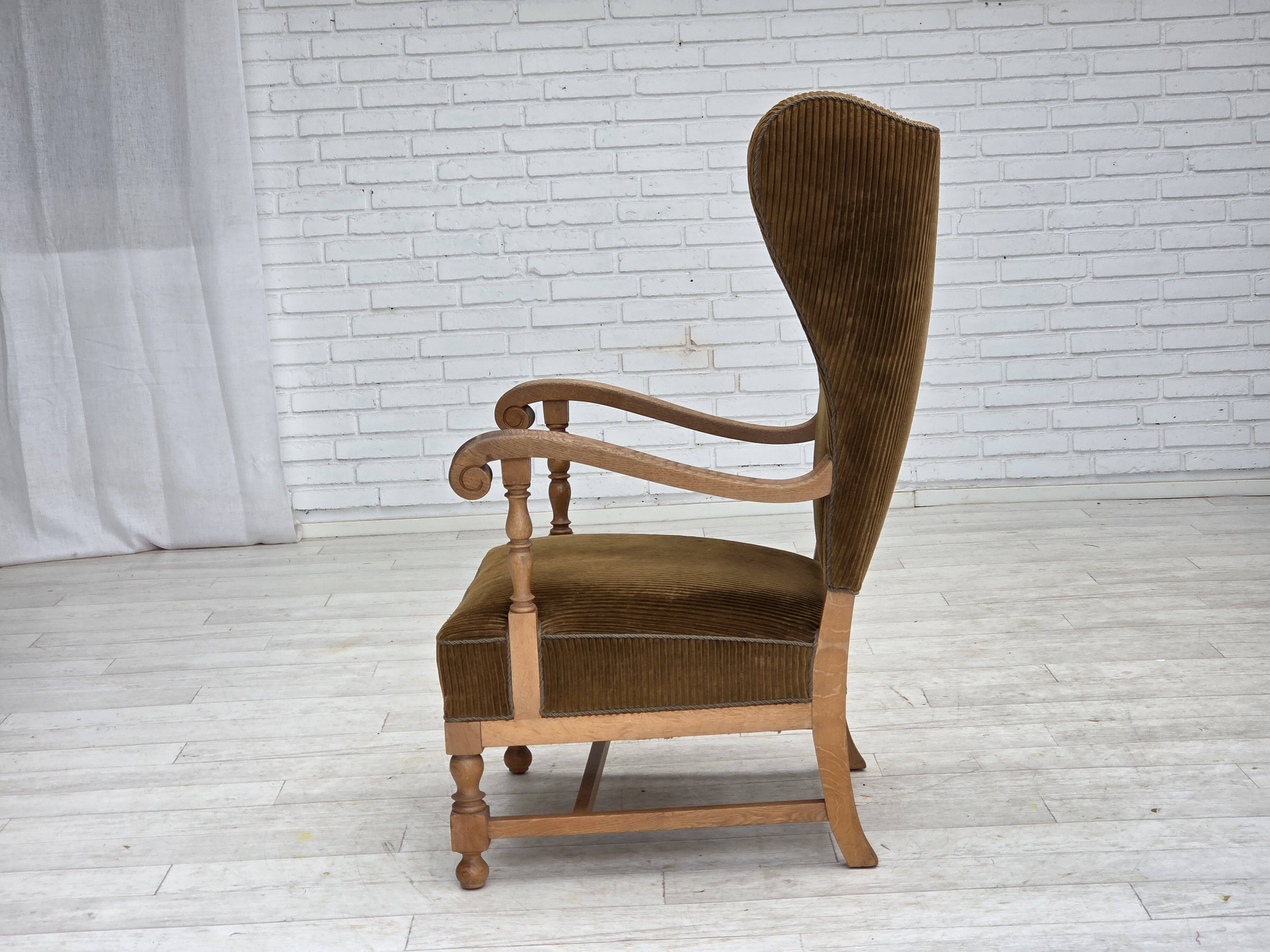 1970s, Scandinavian highback armchair, furniture corduroy, carved oak wood.