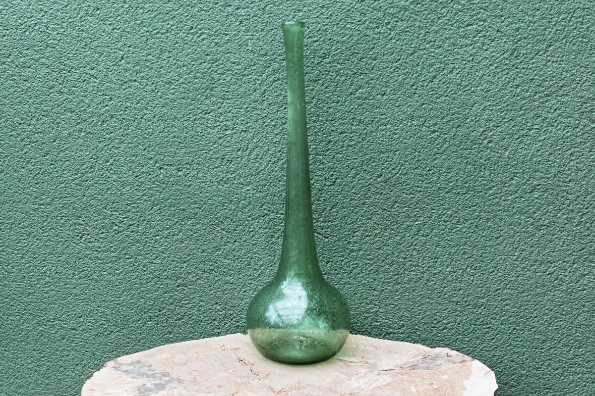 Single-flower vase in blown, bubbled glass, signed Biot