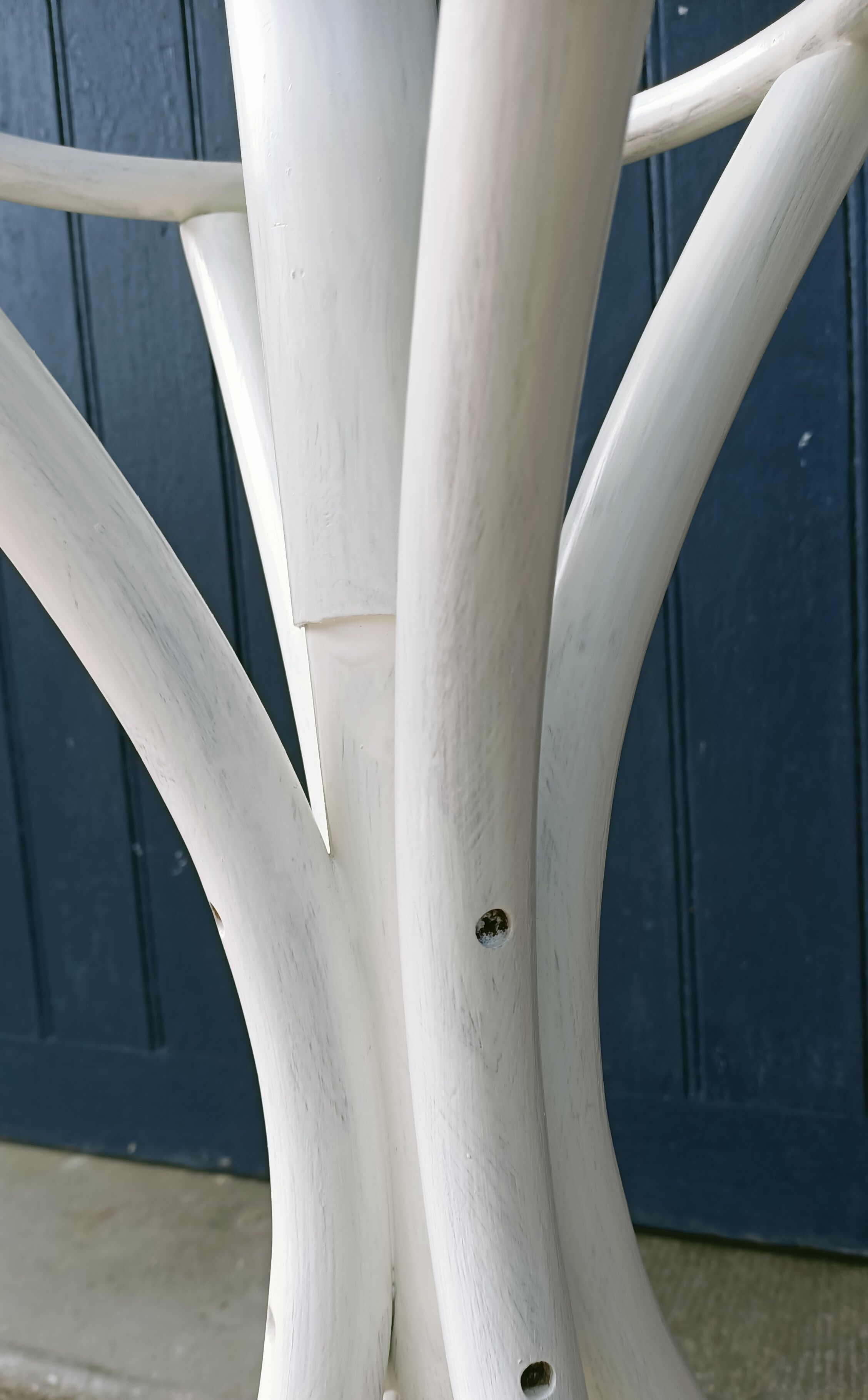 White parrot coat rack