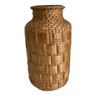 Green glass jar with basketry