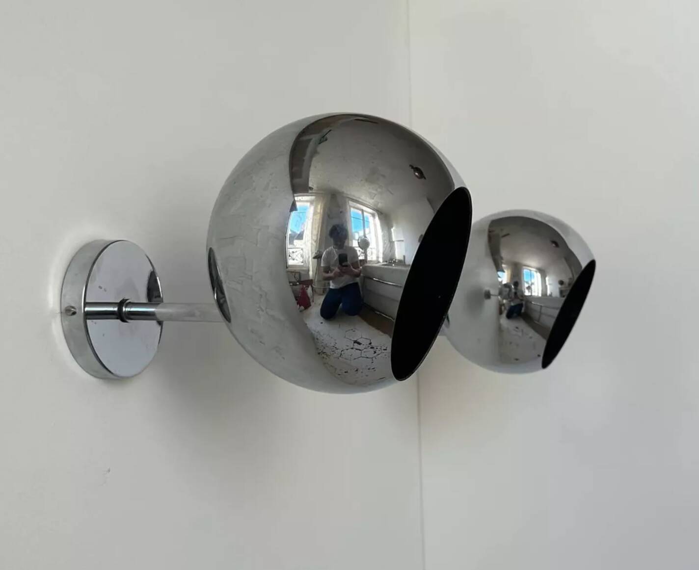 Pair of adjustable wall lights, chromed metal, France 1970