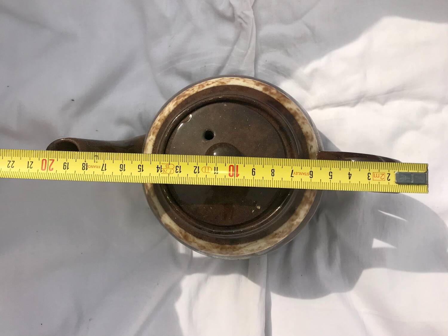 A brown England teapot