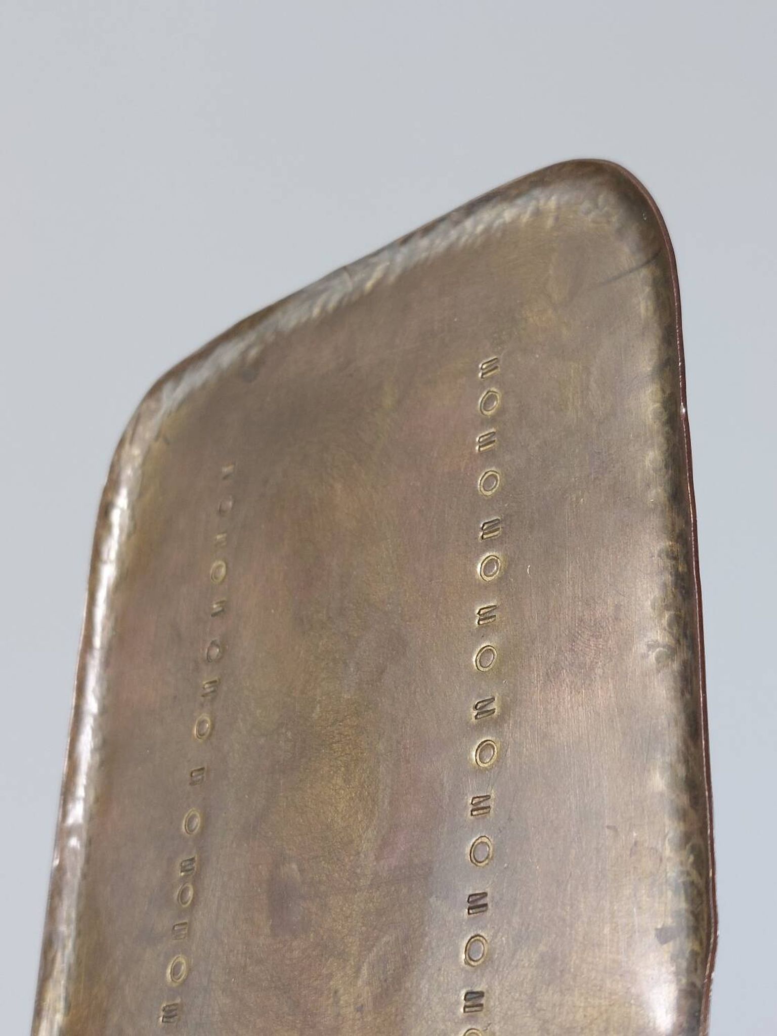 Pair of hand-hammered brass bookends by Hayno Focken