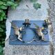Pair of chimera candle holders in bronze, 19th century.