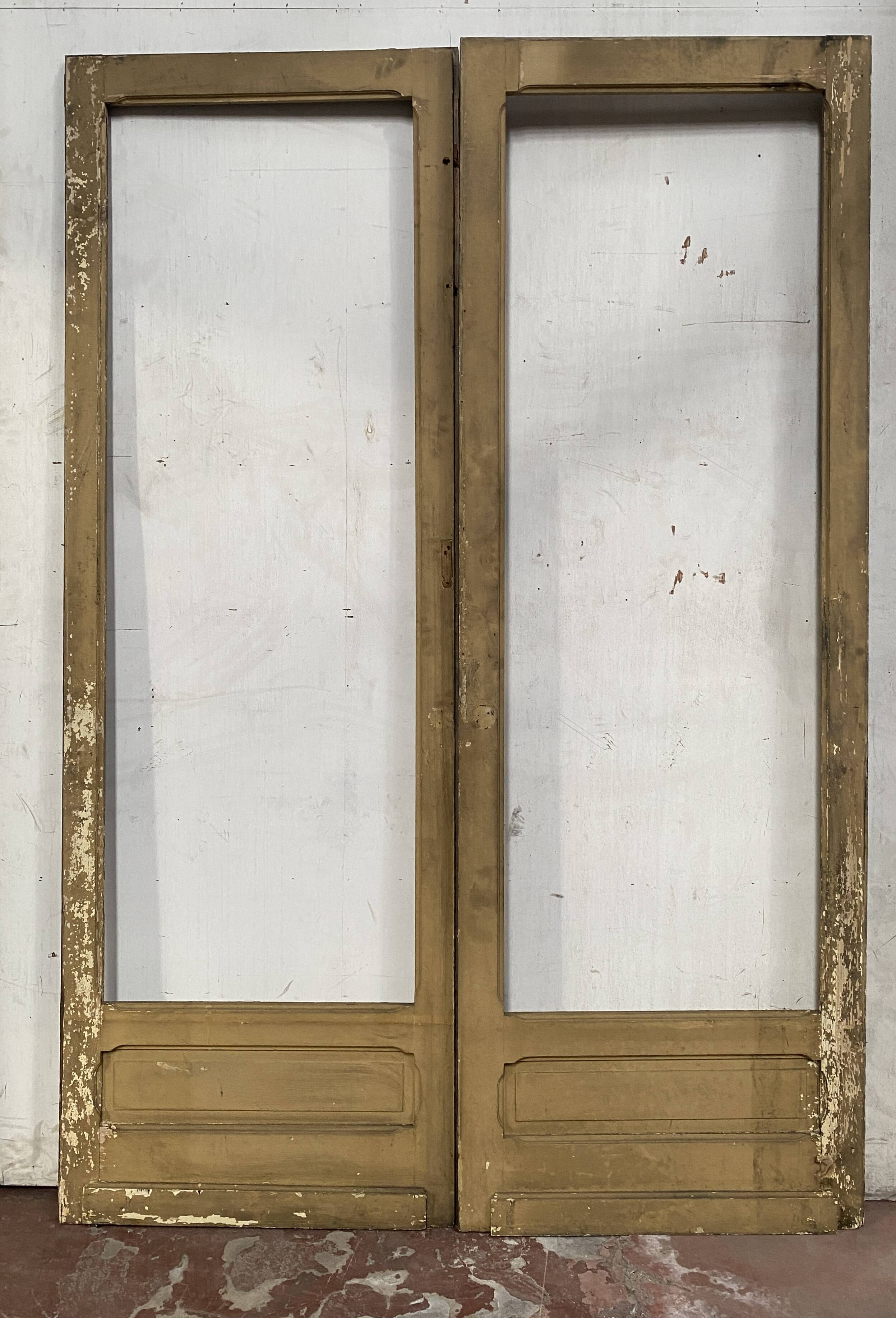 Double glass and patinated fir passage doors, 20th century