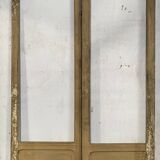 Double portes de passage en verre et sapin patiné, XXème siècle