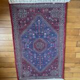 Small Persian wool rug