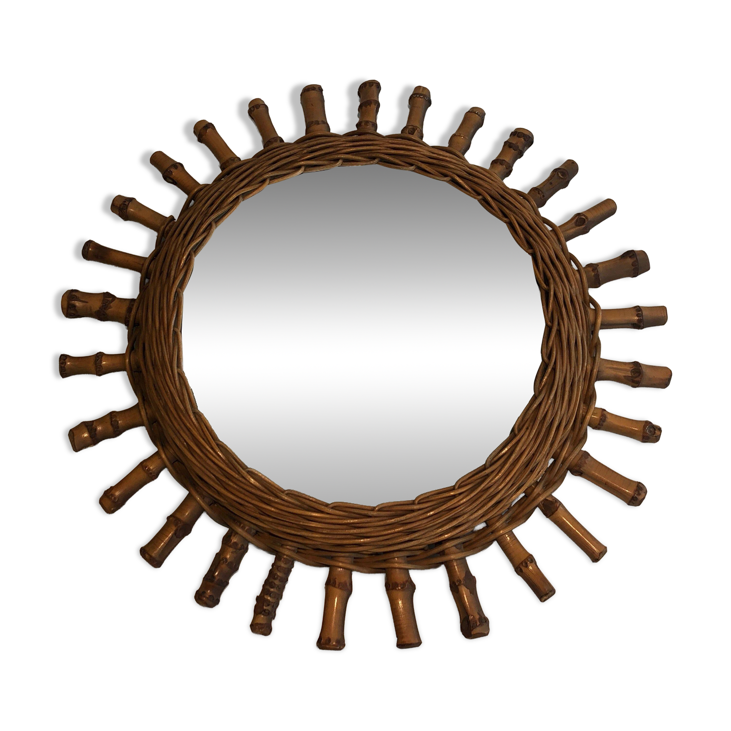 Round rattan mirror
