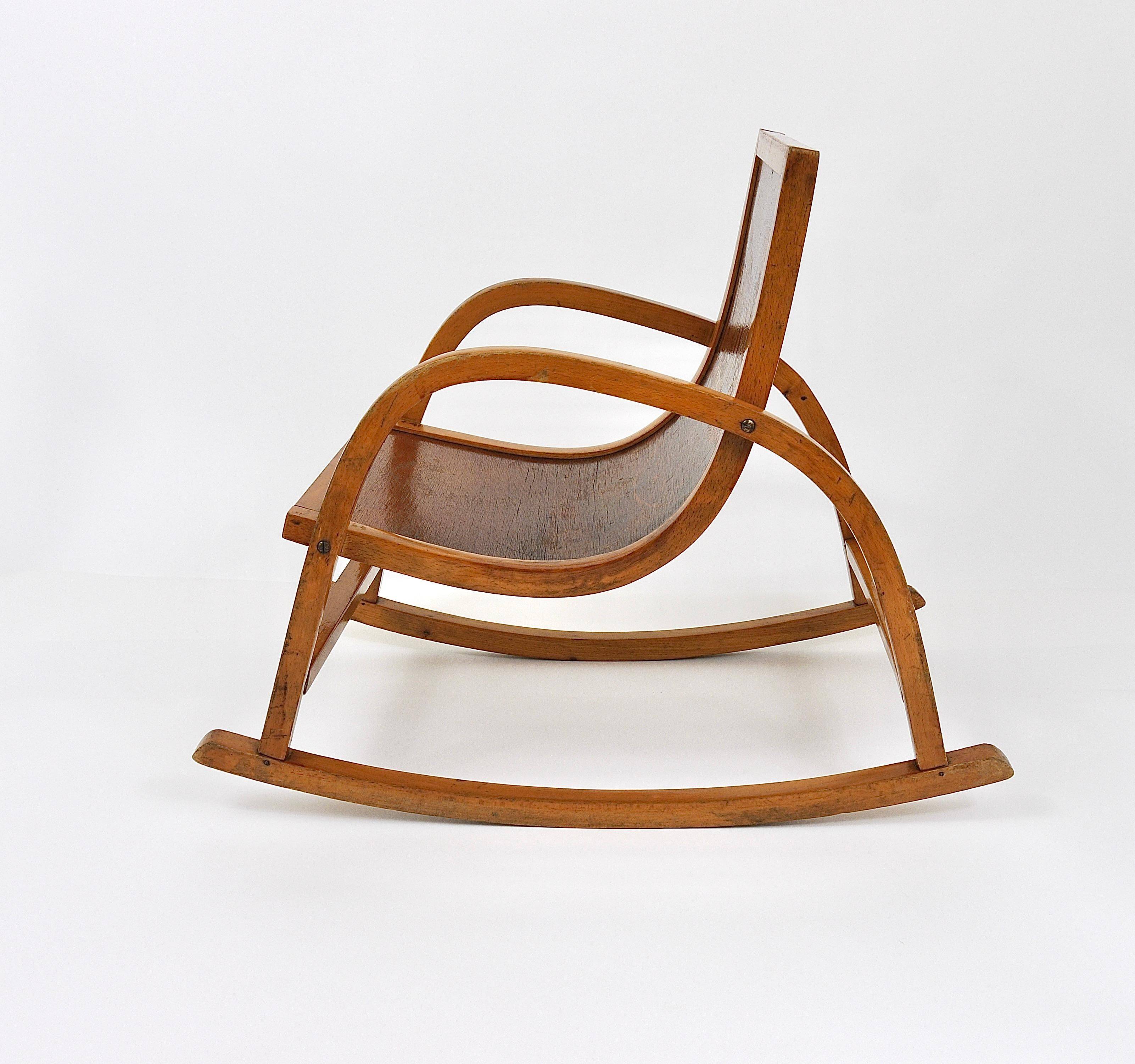 Curved wooden rocking chair for children Bauhaus Brockhage Andrä period, Germany, 1950s