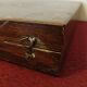 Old mahogany game box with bone tokens, XIXth century