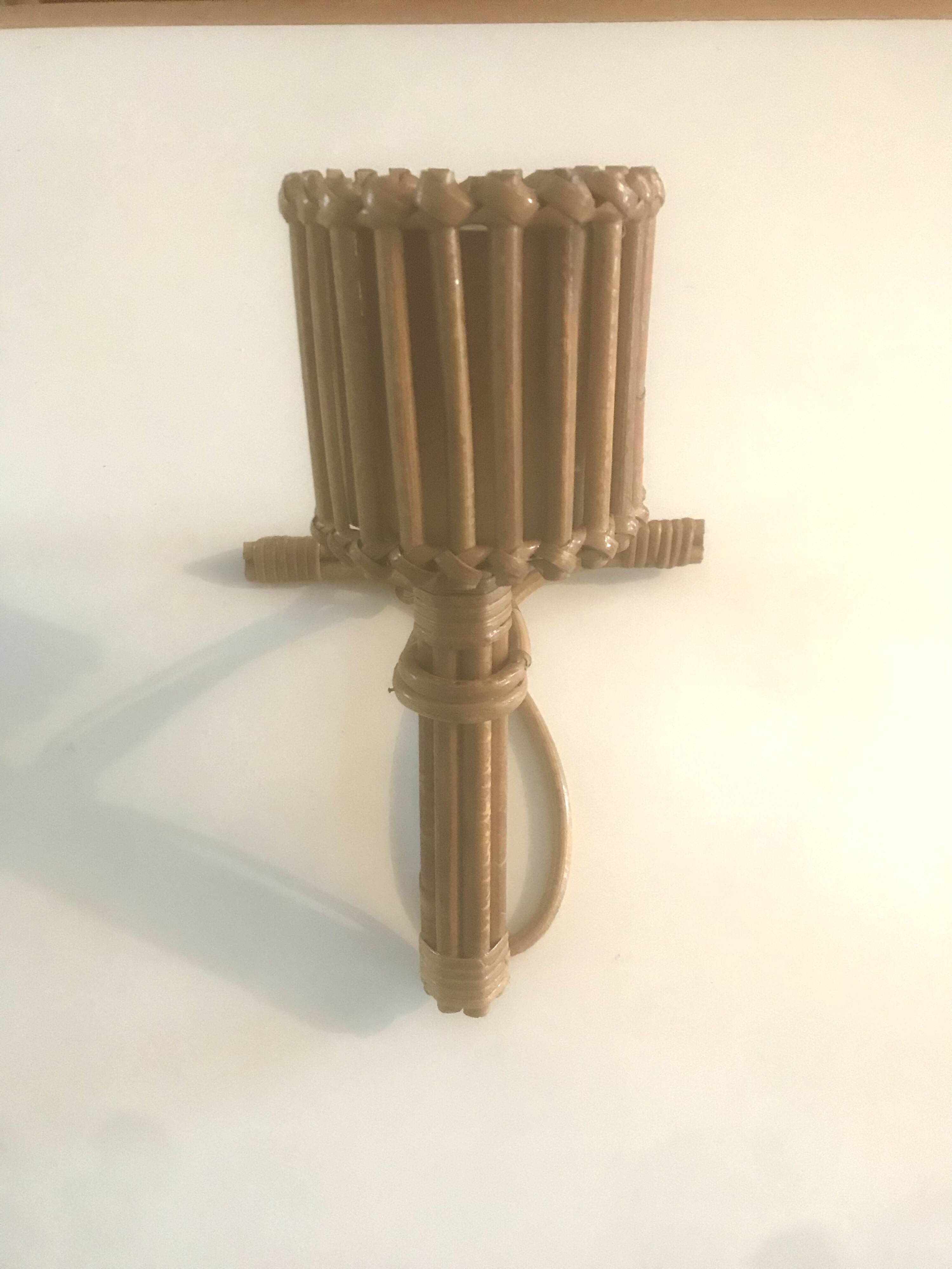 Rattan wall lamp Louis Sognot 1960