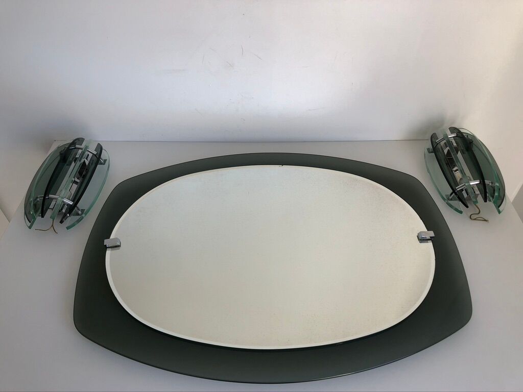 Veca mirror and 2 matching Veca wall lights made in Italy.