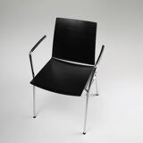 Mid-century modern black design chair in with armrests, Belgium