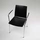 Mid-century modern black design chair in with armrests, Belgium
