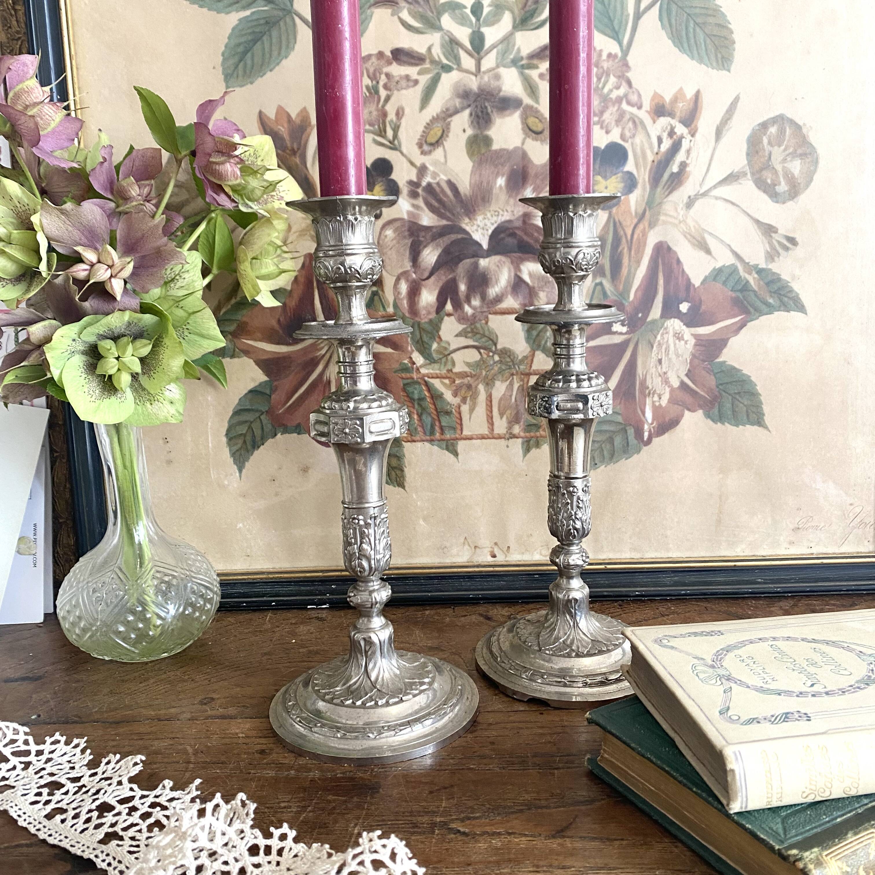 Antique silver-plated metal candlesticks