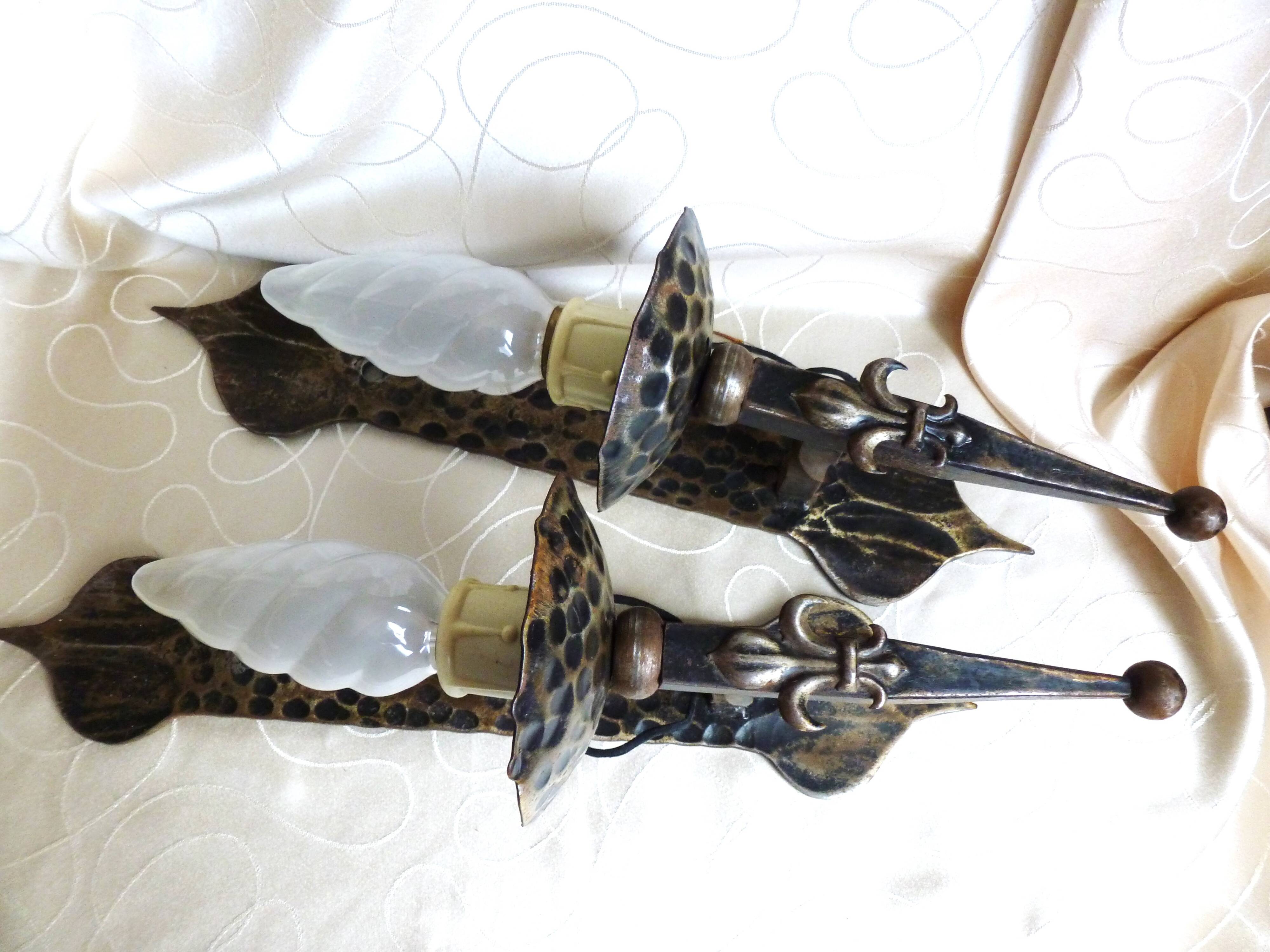 Medieval wrought iron wall lights / antique medieval lighting.