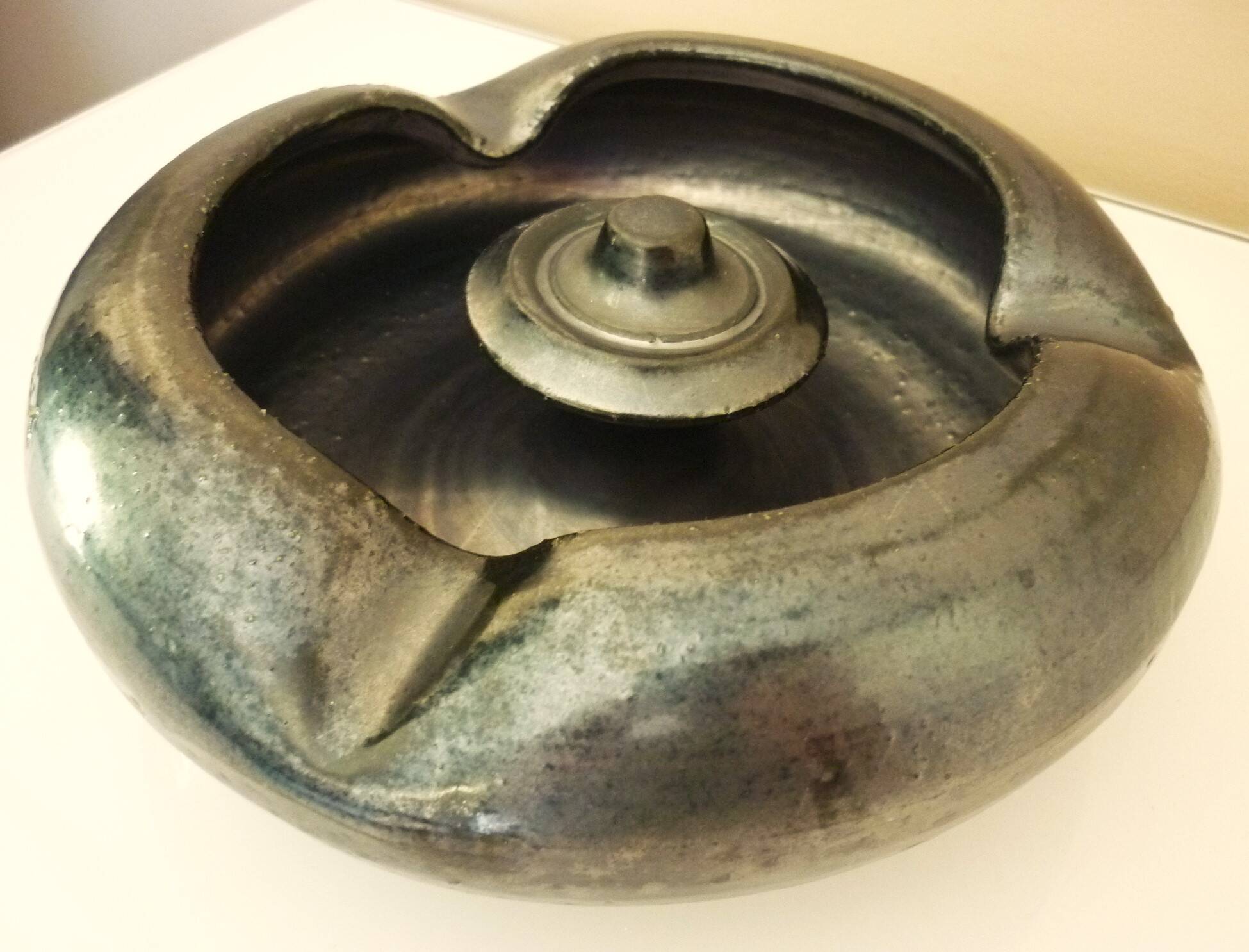 Black ceramic ashtray, enamelled, signed Jean Marais, 1960s/1970s