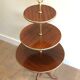 Round table of neoclassical style with triple plateaux 1940