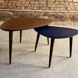 Pair of tripod and nesting coffee tables in walnut and midnight blue