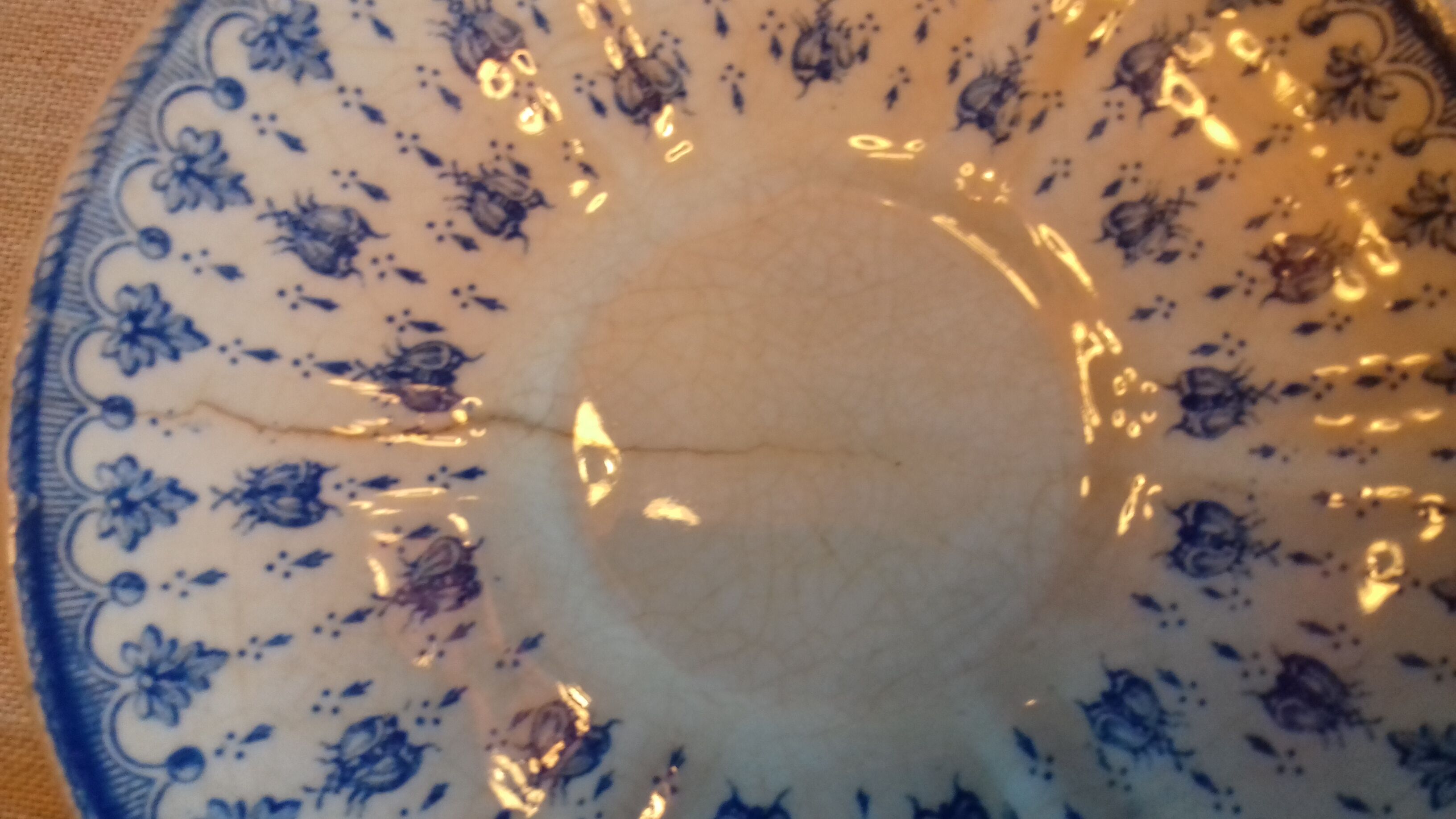 2 old coffee cups with their saucer, with blue bee patterns