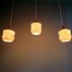 Art Deco trio of suspensions in opaline and marbled ouraline, Scailmont, 1920-30.