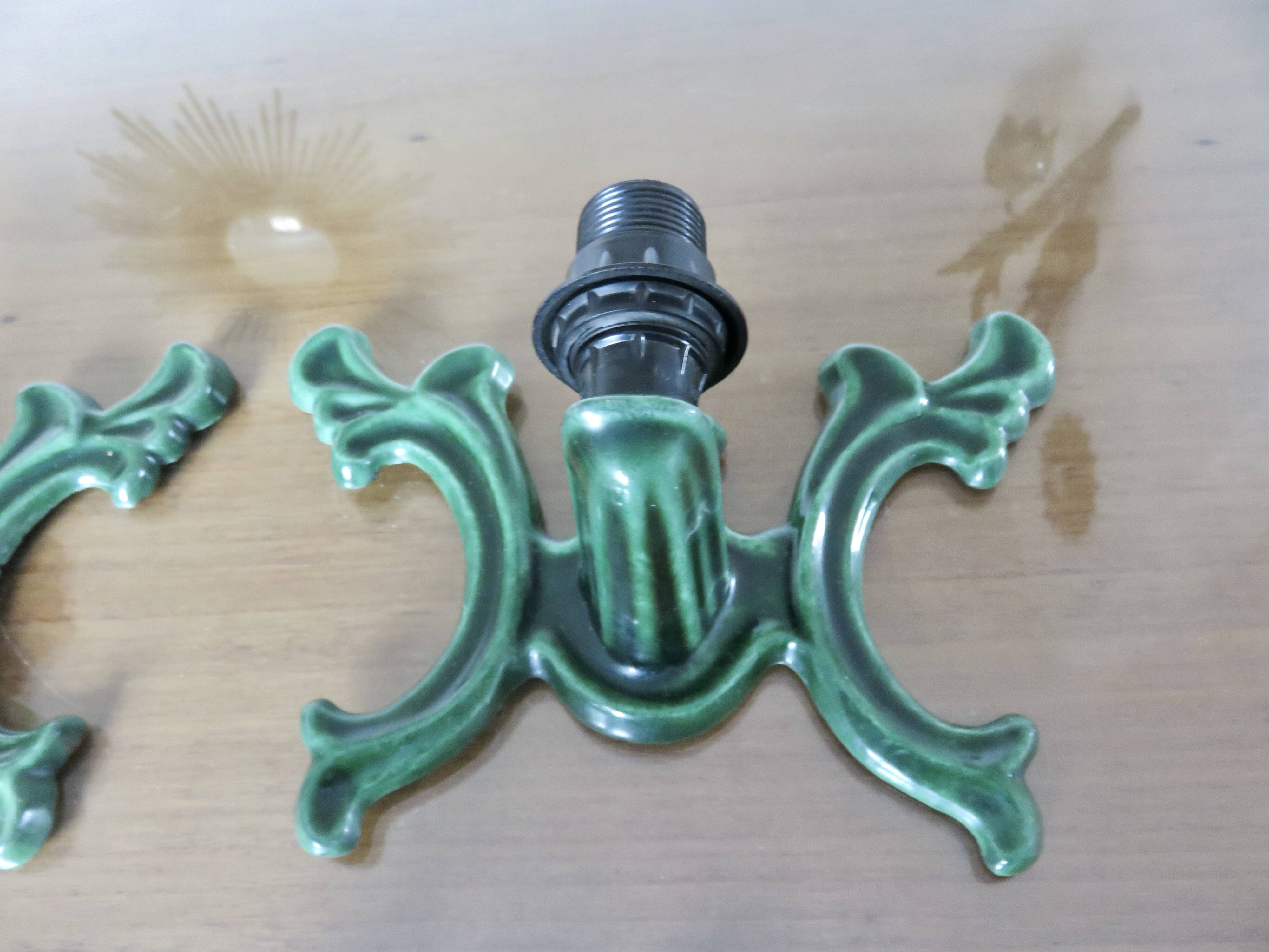 Series of 3 green enameled cast iron wall lights from the 30s and 40s