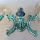Series of 3 green enameled cast iron wall lights from the 30s and 40s