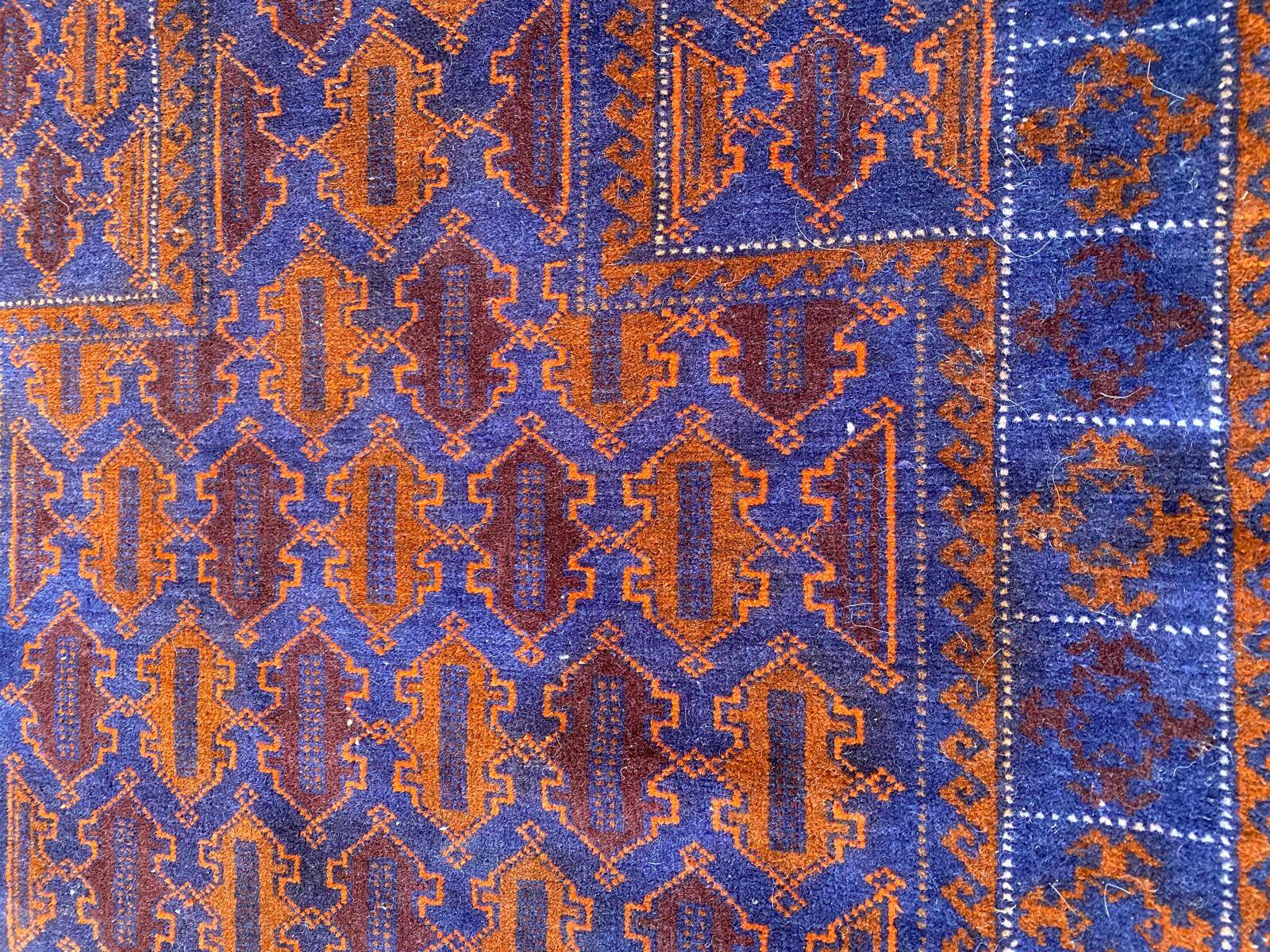 Persian wool rug in burgundy blue 130x85