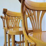 Ensemble de 4 chaises hautes de bar vintage en bois courbé avec accoudoirs / Couleur bois naturel
