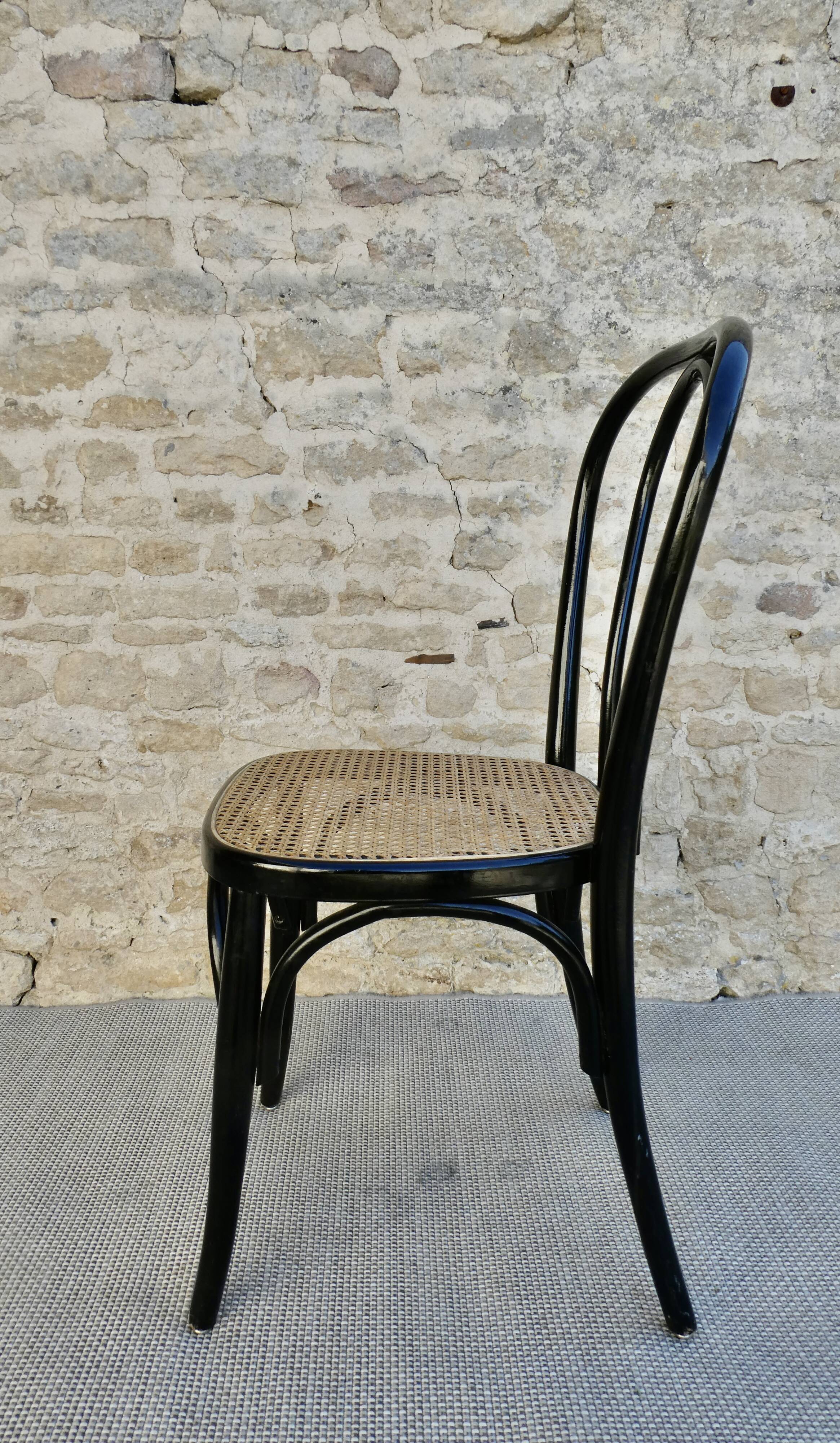 Bistro chair in black lacquered wood and seat in cannage