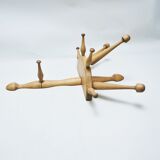 Turned wood wall coat rack