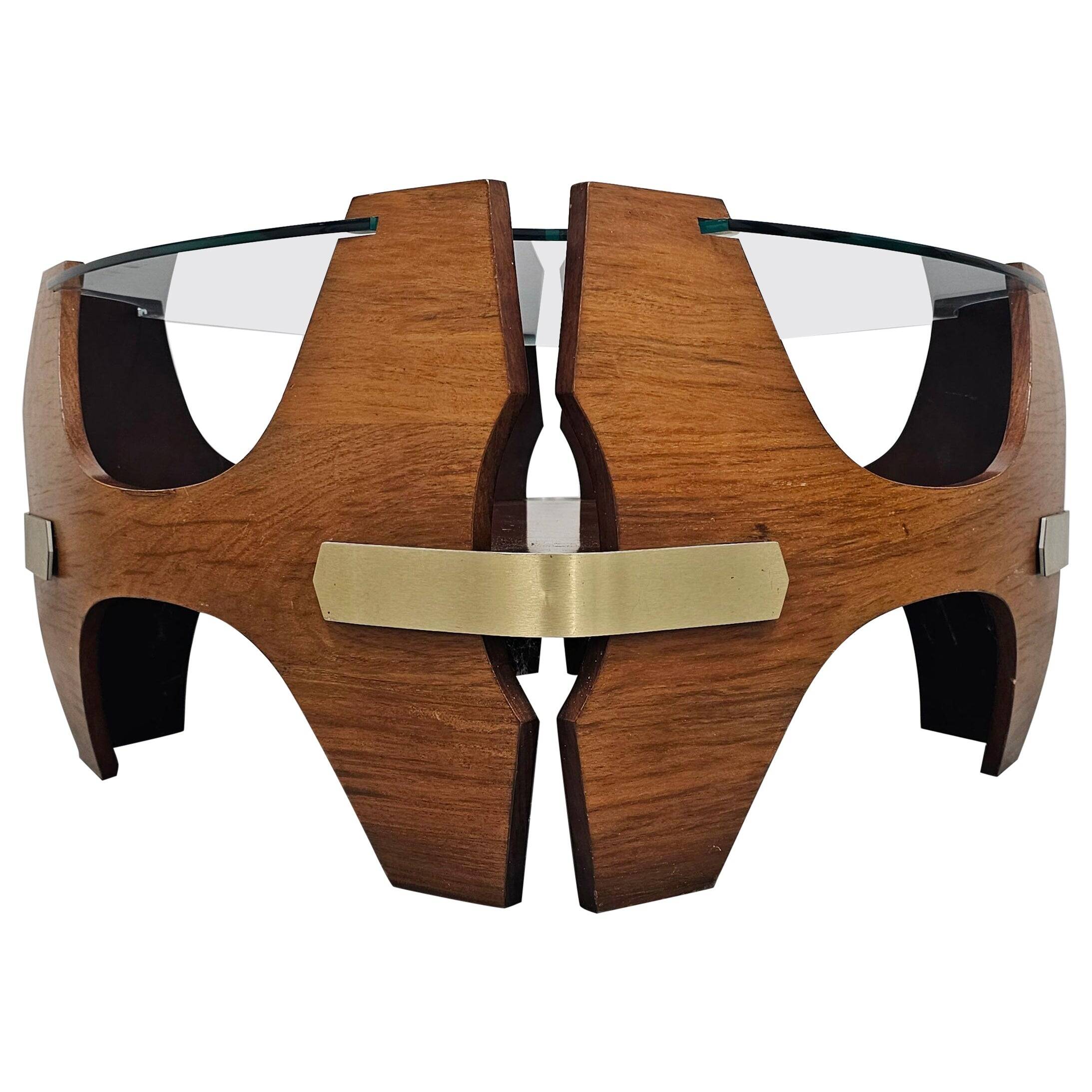 Mid-century coffee table in curved plywood with a glass top, 1940s.