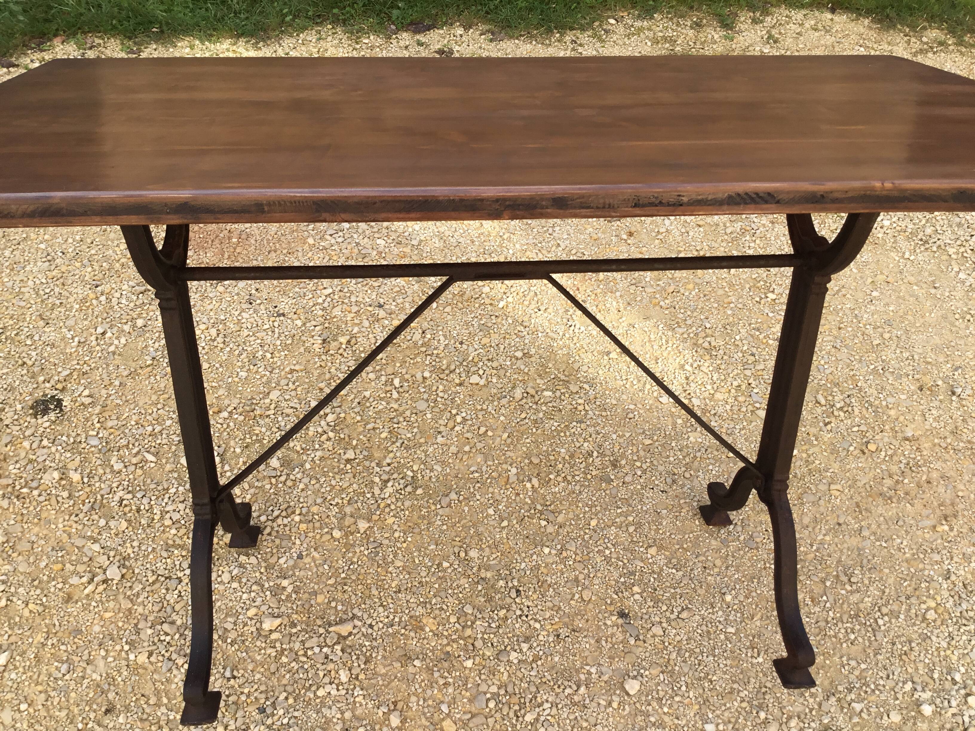 Cast iron and wood bistro table