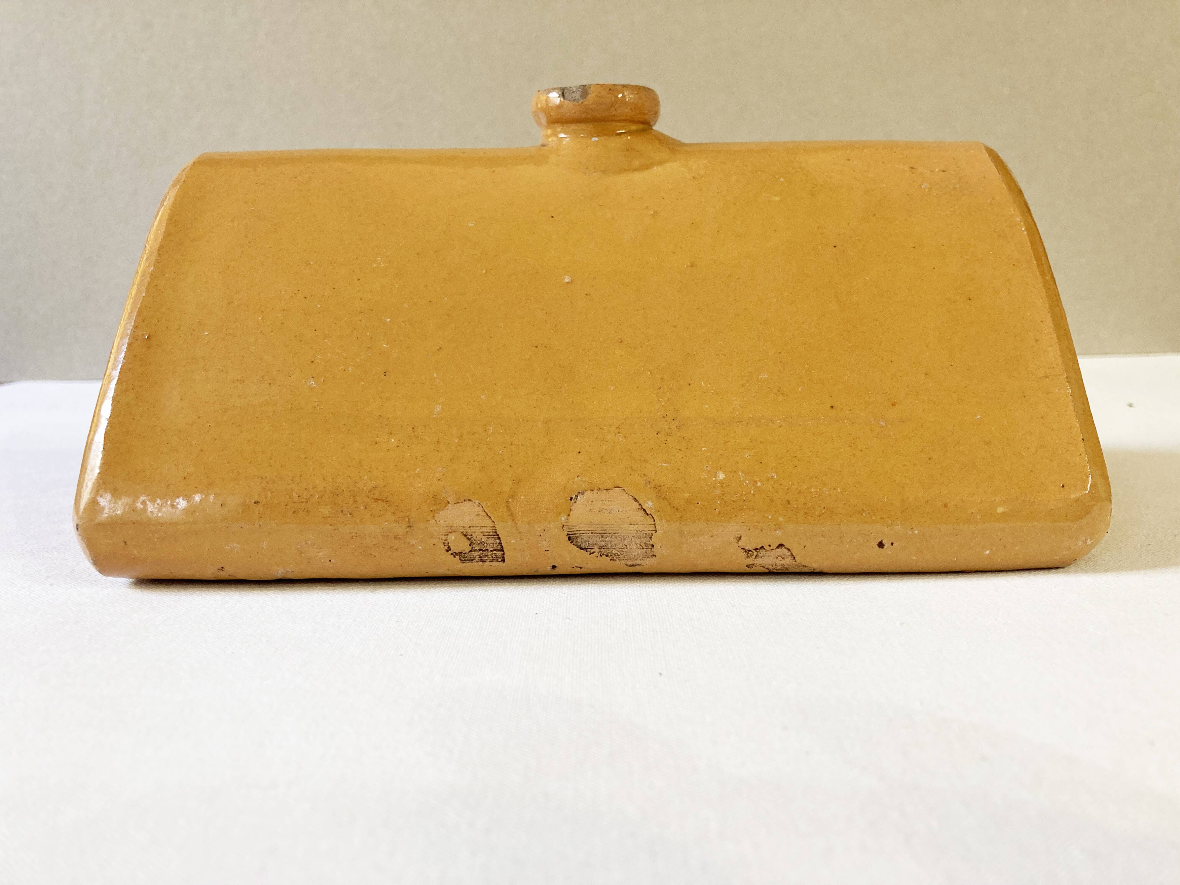 Old sandstone hot water bottle