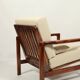 Vintage dark wood beige bouclé armchair by Z.Baczyk 1965