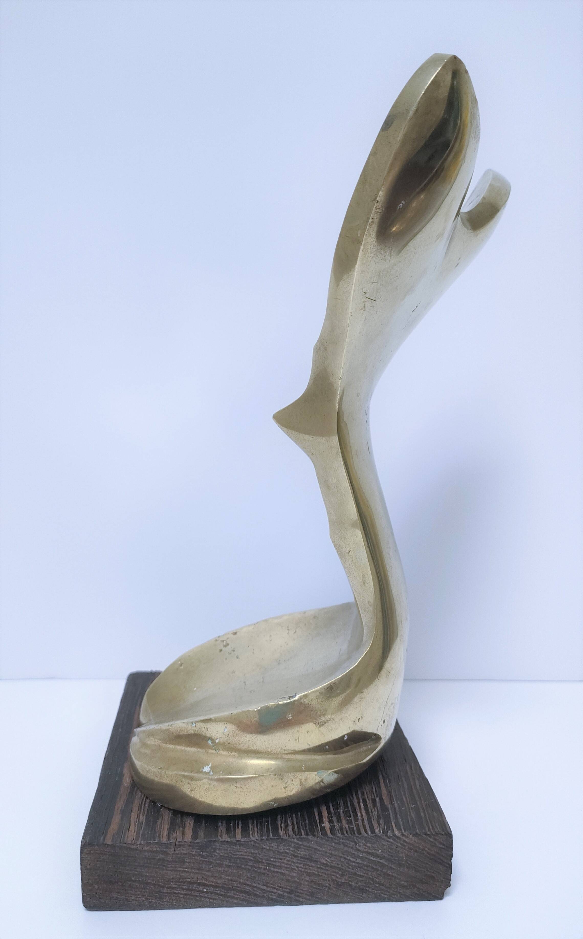 Gilded bronze and sculptural wood paperweight