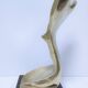 Gilded bronze and sculptural wood paperweight