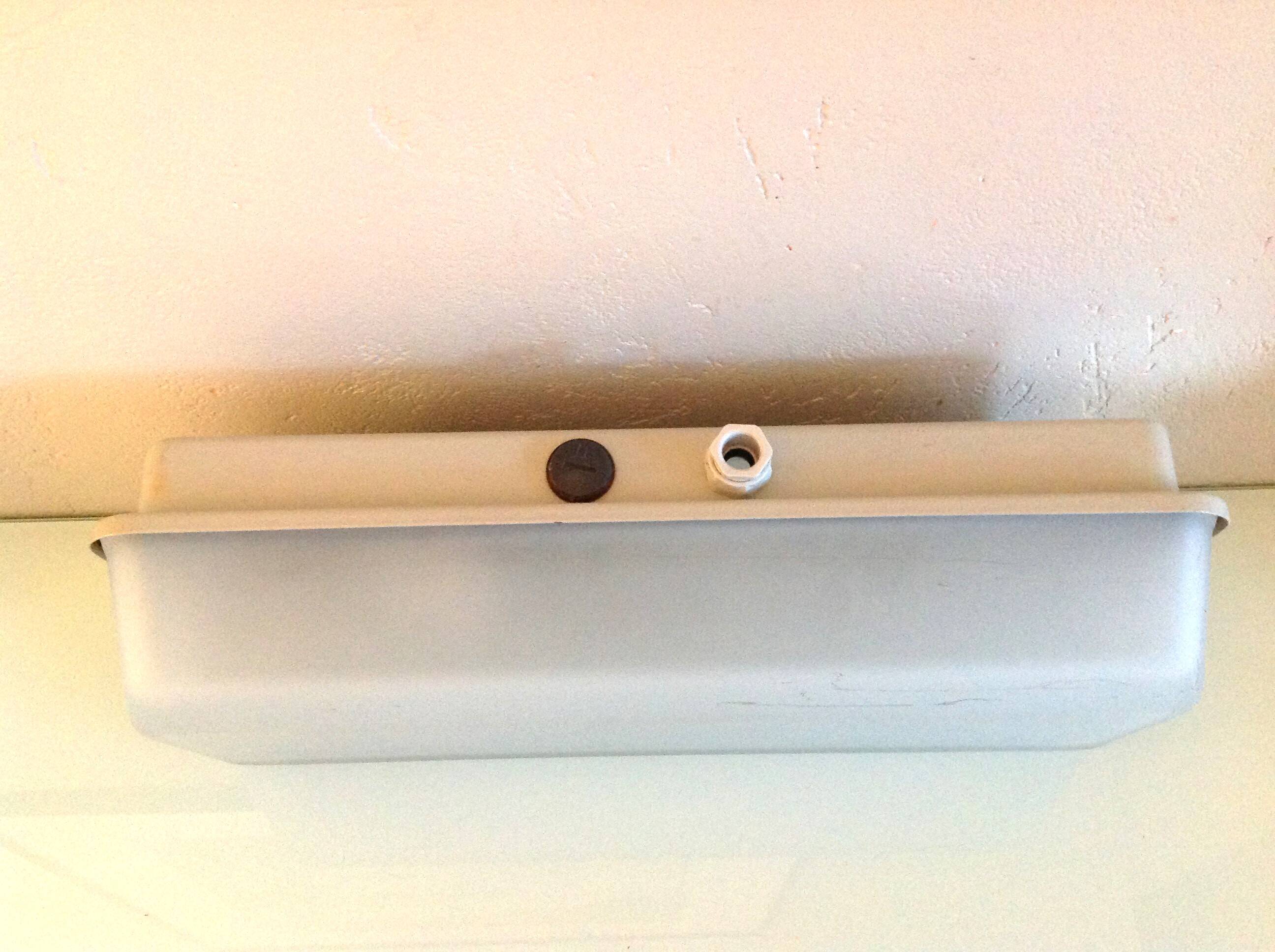 Rectangular porthole wall light in industrial/70s style frosted glass