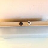 Rectangular porthole wall light in industrial/70s style frosted glass