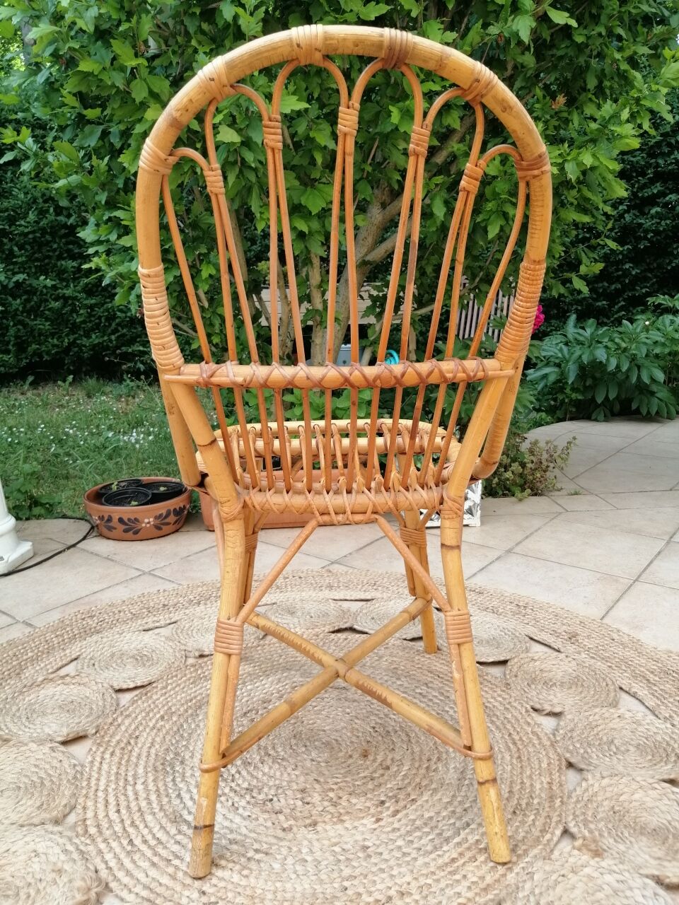 Series of 4 vintage rattan chairs.