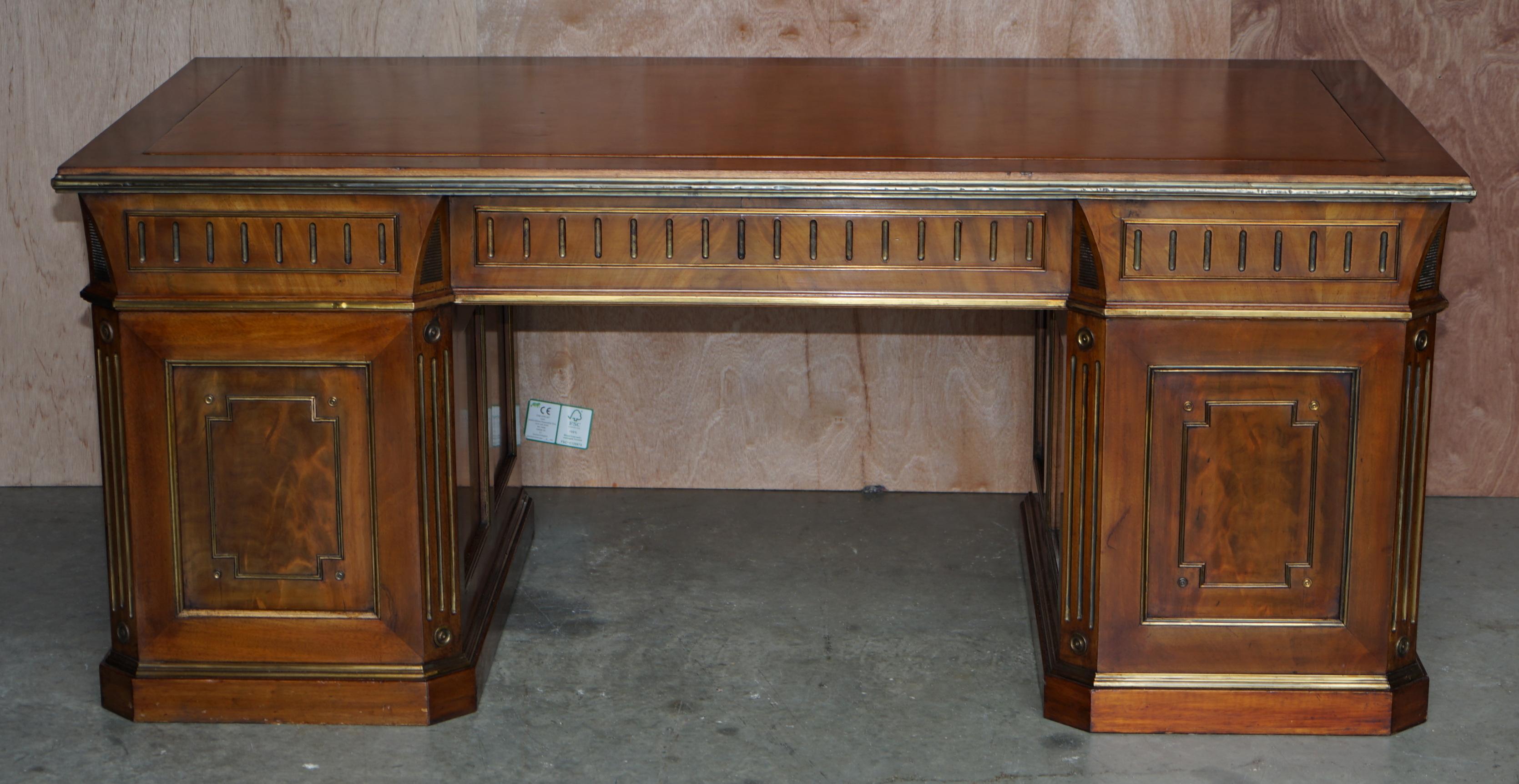 Restored antique Russian hardwood partner desk and leather armchair.
