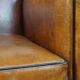 Sheep leather Art Deco design armchair finished with black piping
