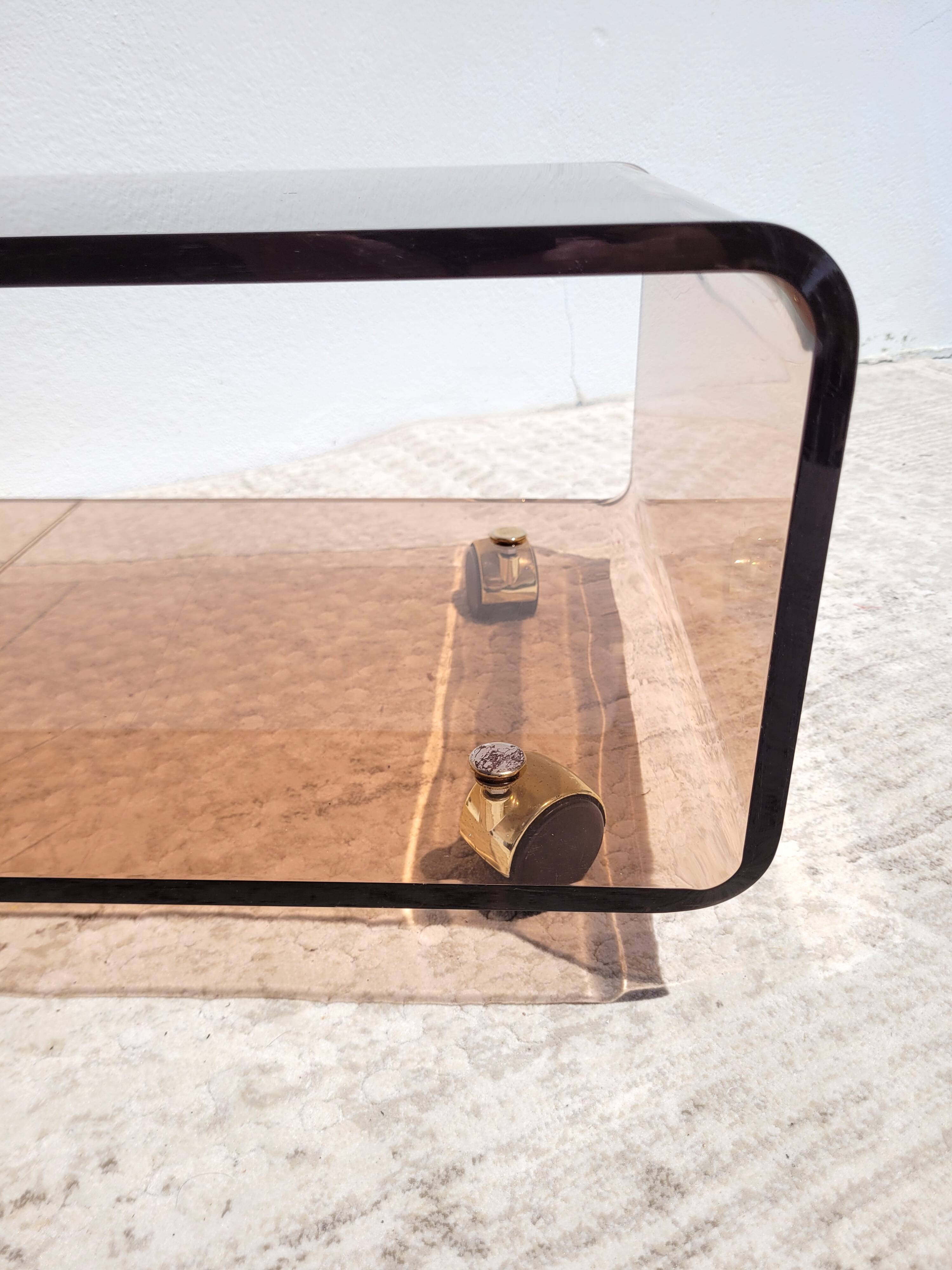 Vintage plexiglass coffee table with wheels 1970