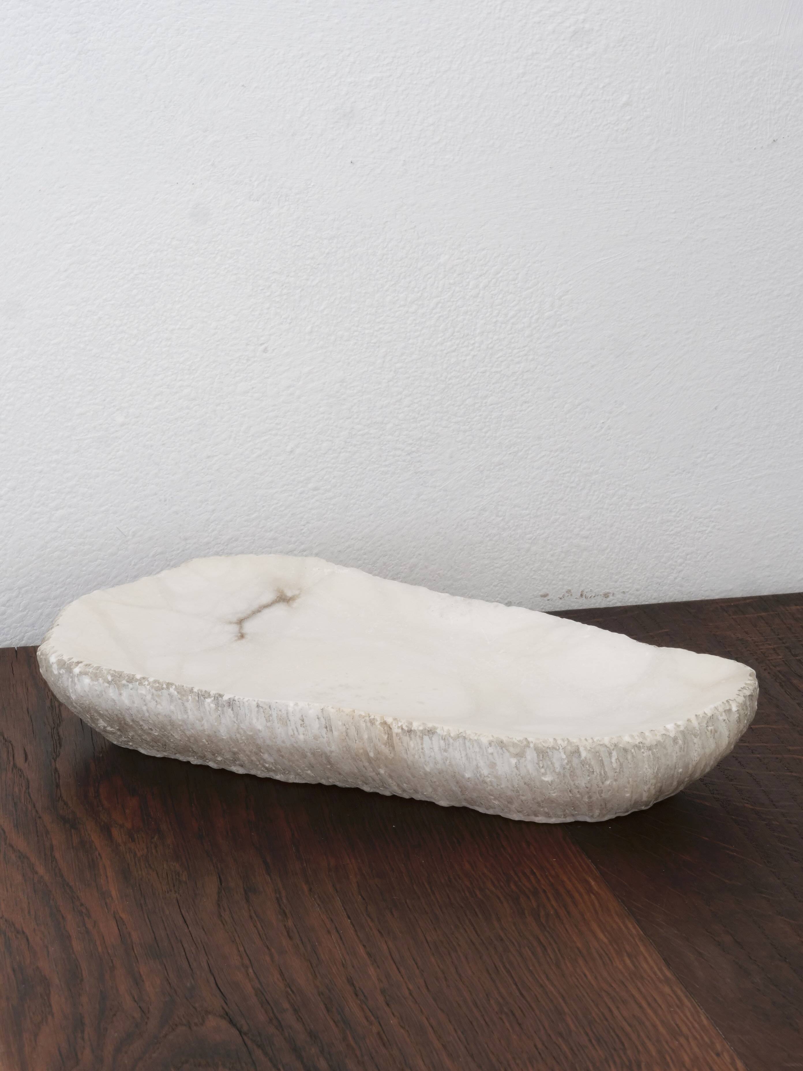 Brutalist free-form alabaster emptier