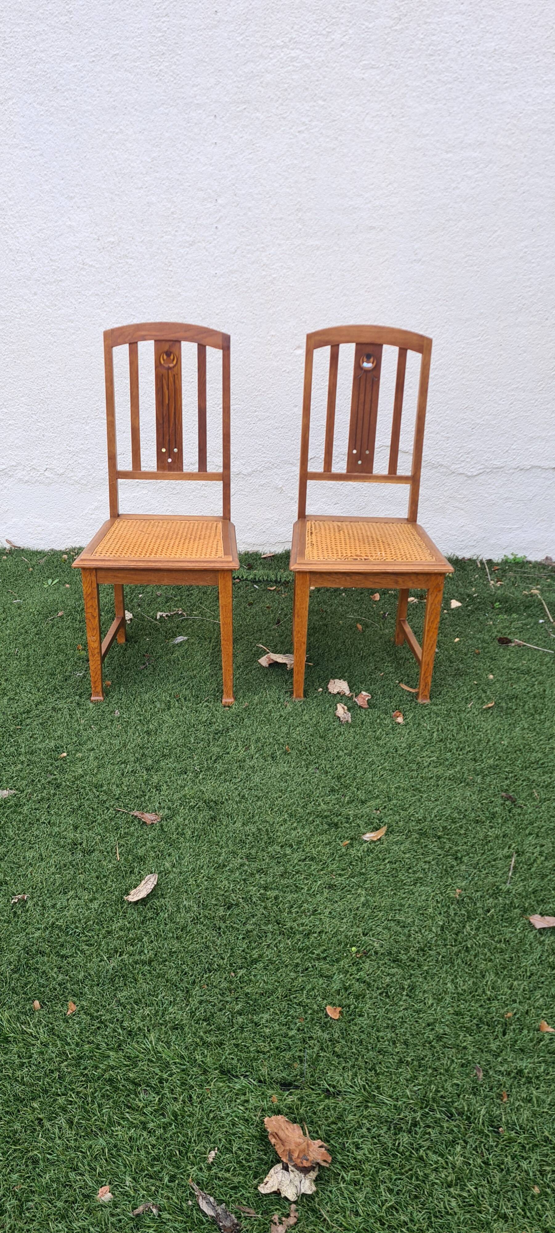 Pair of art and kraft chairs