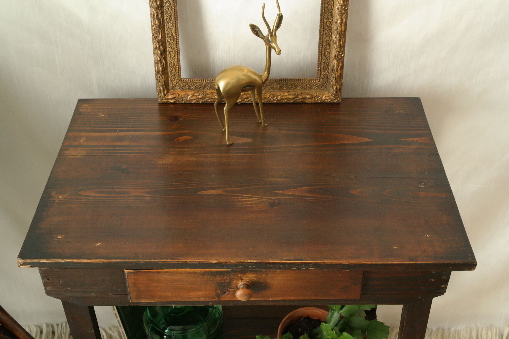 Old country side table in waxed wood