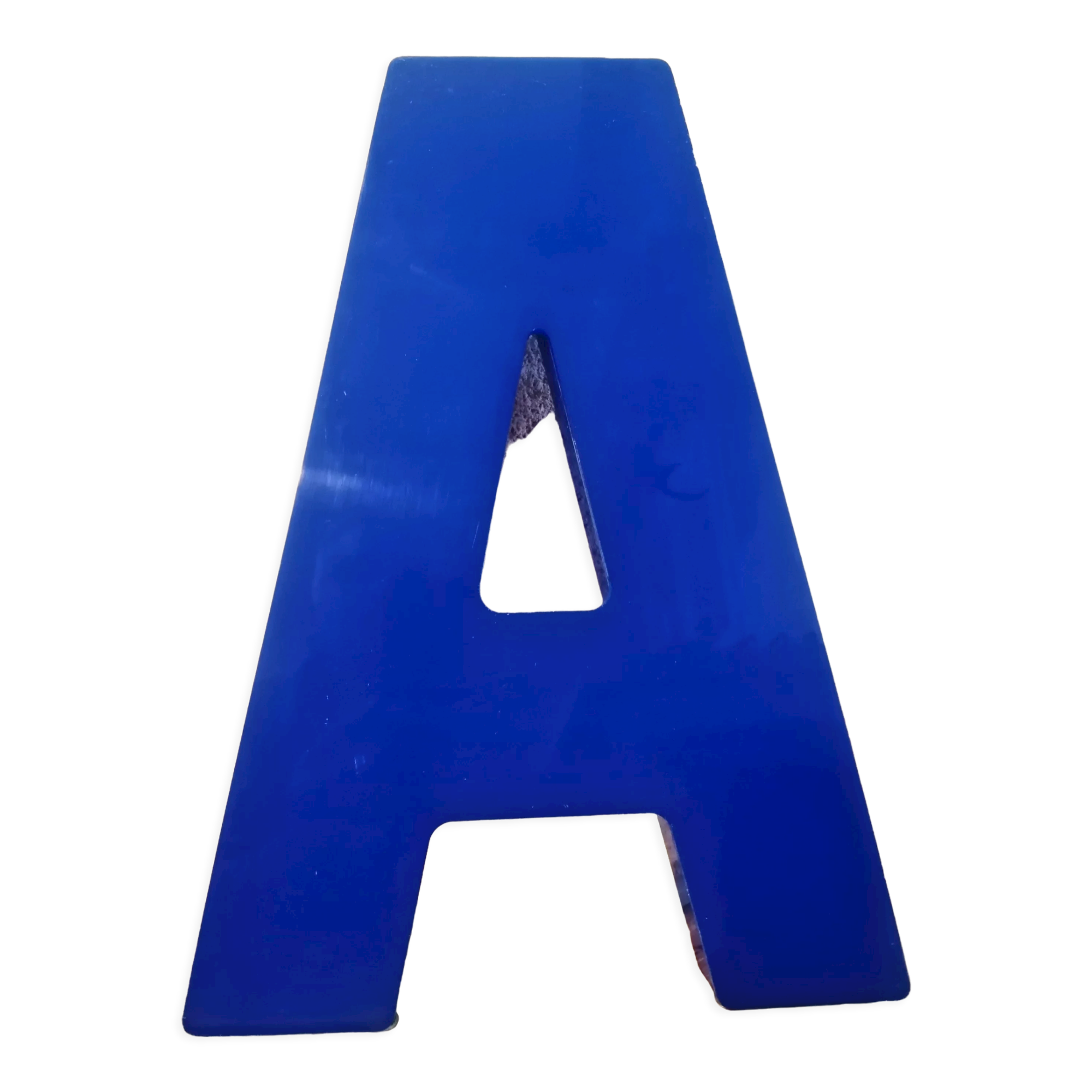 Letter A sign in vintage blue plexiglass