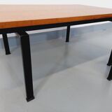 Suite of two vintage modernist Isa coffee tables in teak and black metal from the 60s